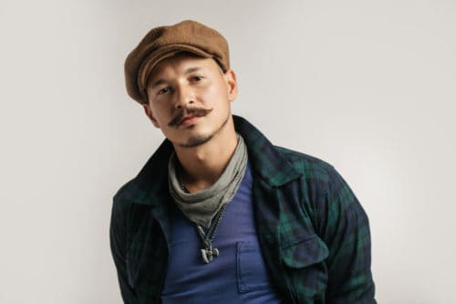 Walrus mustache look with small curls