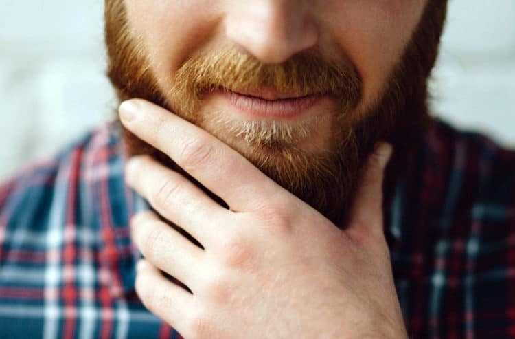 Using beard balm or beard butter can help soften beard hair. 