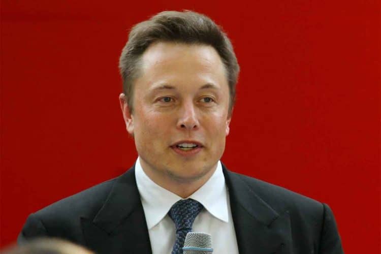 Elon Musk full head of hair.