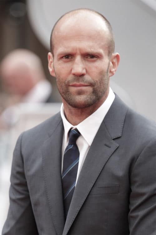 Jason Statham shaved head beard stubble