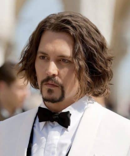 Long bob hairstyle (parted) with a Circle Beard Goatee in a white tuxedo.