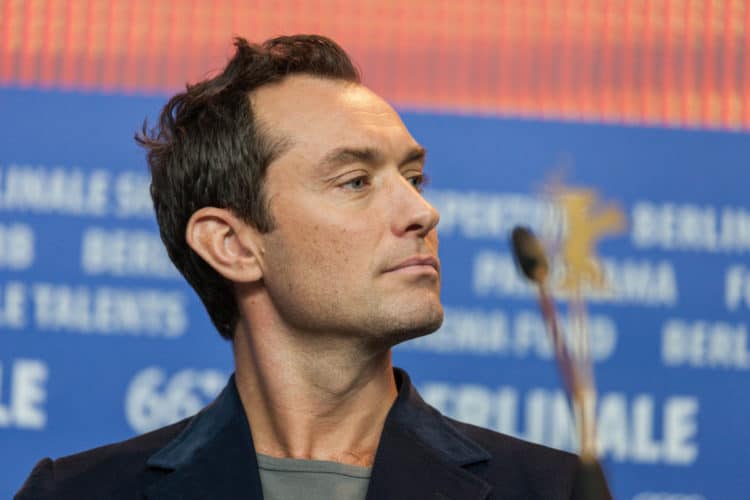 Jude Law Short Sideburns and mature hairline.
