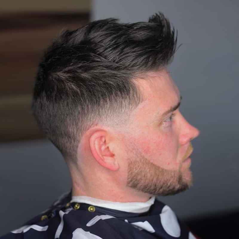 Mid Taper haircut with a Low Fade blend