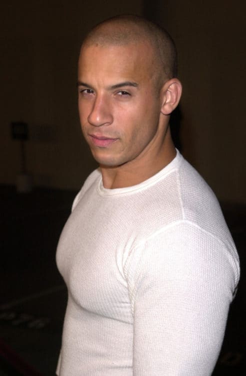 Vin Diesel masculine bald look.