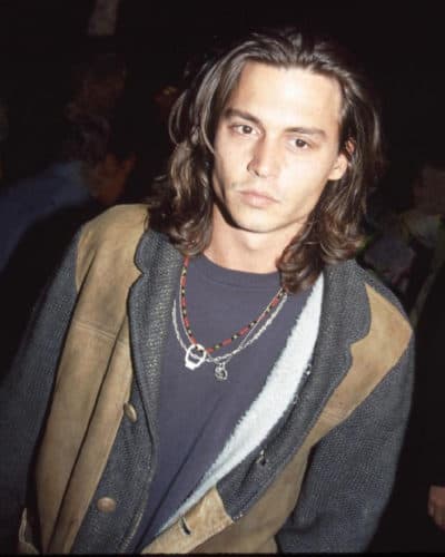 Johnny Depp with long wavy hair.